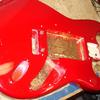 Shielding the control and pickup cavities of a Stratocaster with conductive copper tape